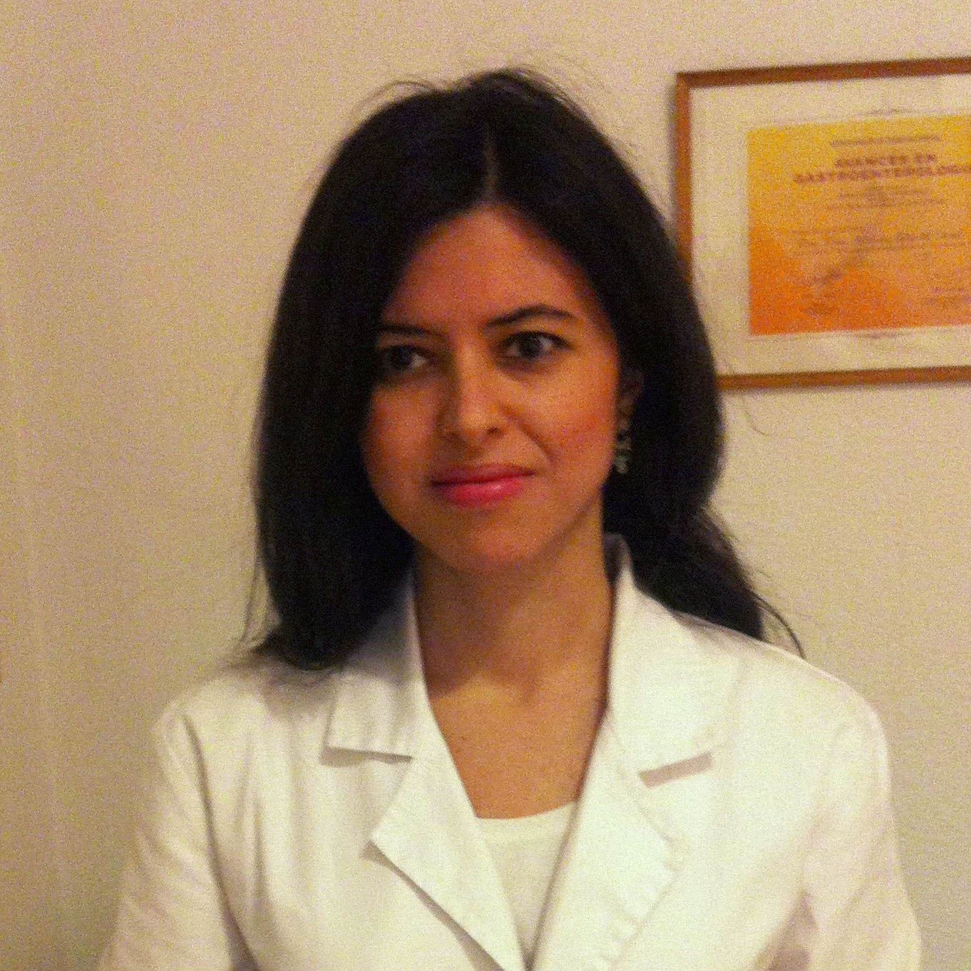 smiling-doctor-with-chin-on-hand-s